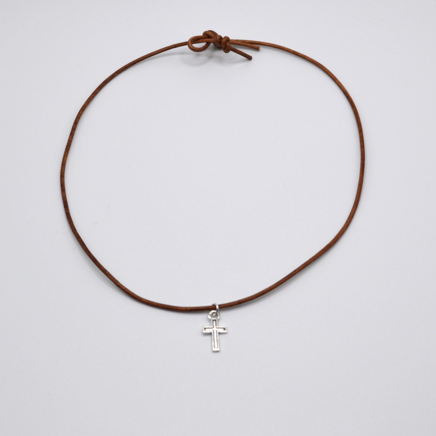 Silver Cross on a Leather Cord