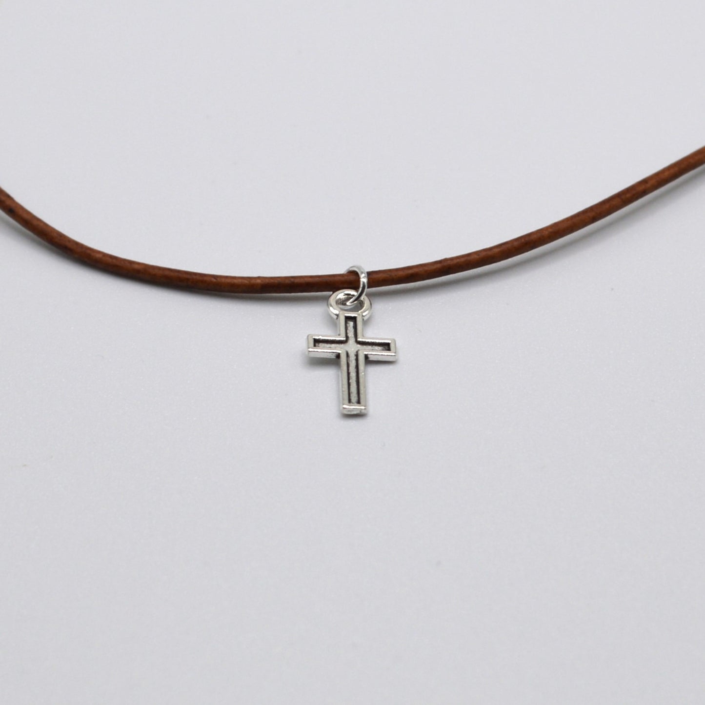 Silver Cross on a Leather Cord