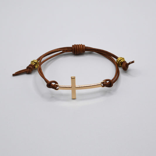 Gold Cross on a Leather Cord Bracelet